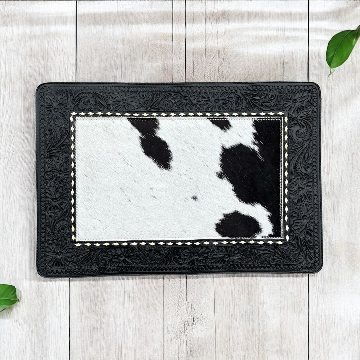 Black cowhide & tooled placemat dinner table