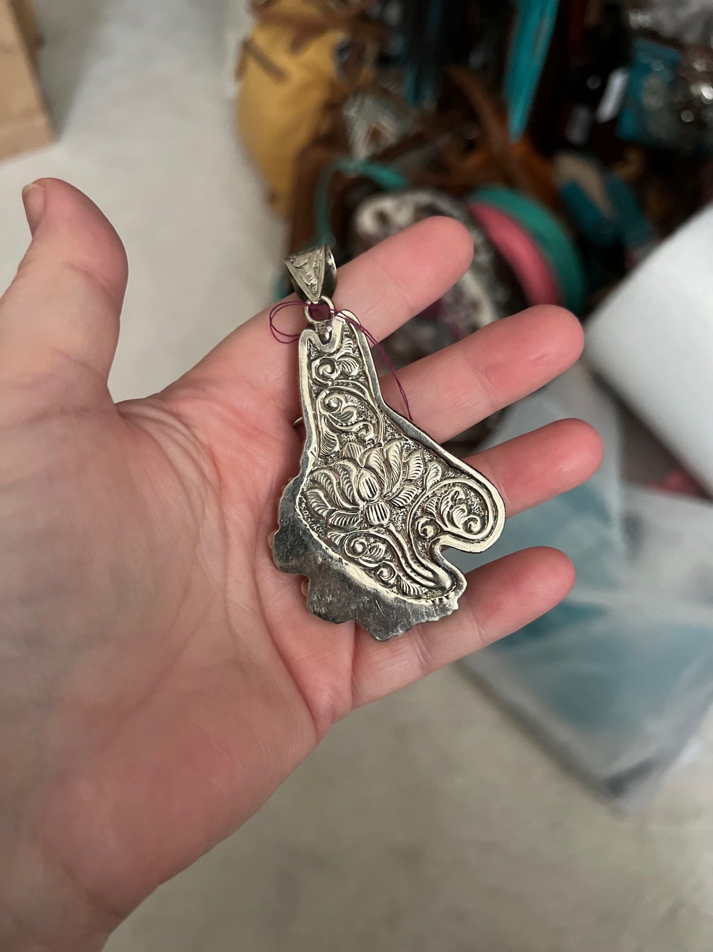 Ornate hand carved silver donkey/horse pendant