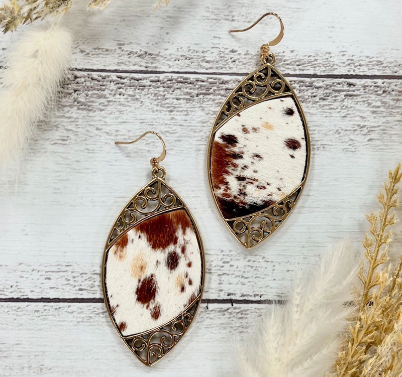 Cowhide Serenade: Gilded Gold Scroll Earrings with A Twist