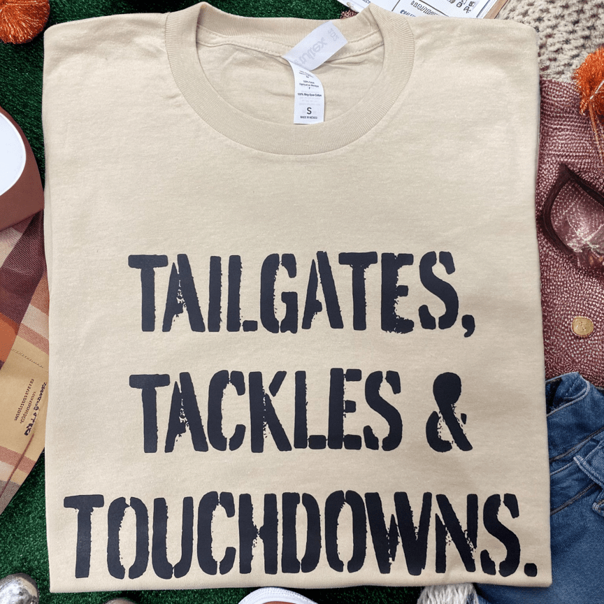 Tailgates and Touchdowns Graphic Tee ( This is a Drop Ship Item, Not Available for Pick up)