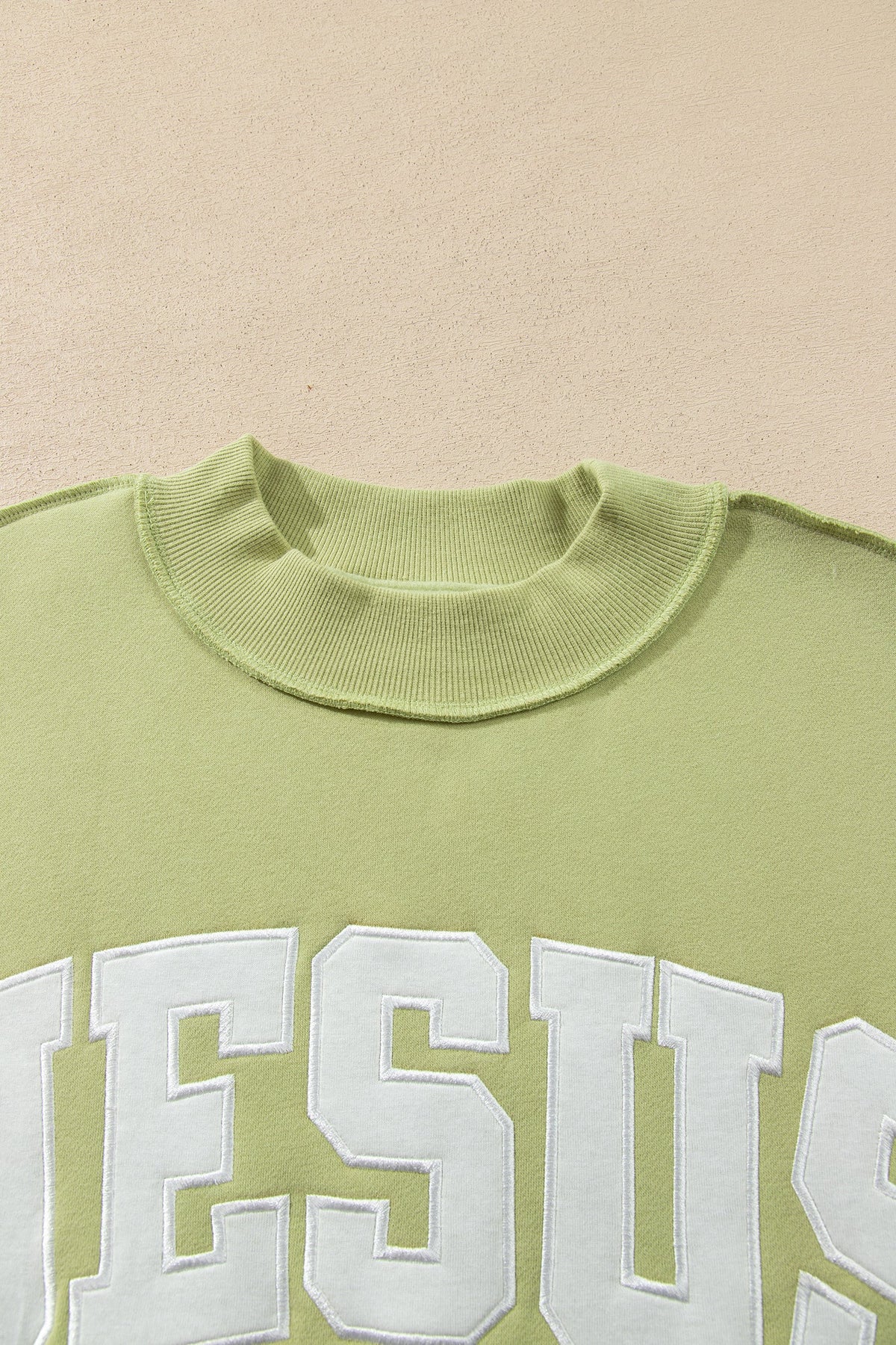 JESUS Letter Print Exposed Seam Mock Neck Sweatshirt