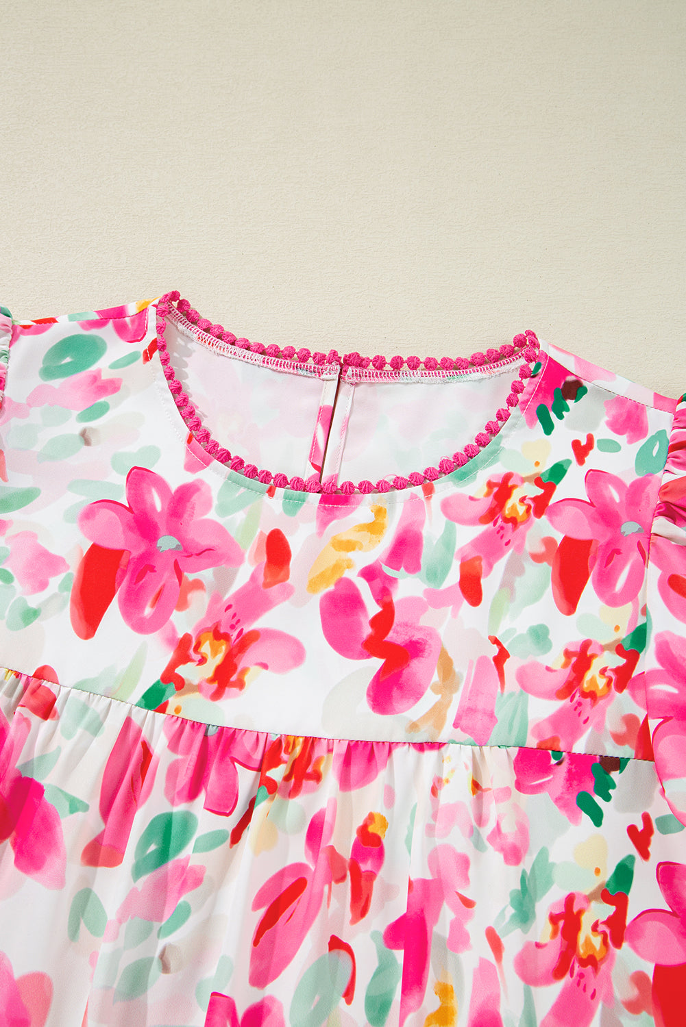 Floral Flutter Sleeve Round Neck Blouse.