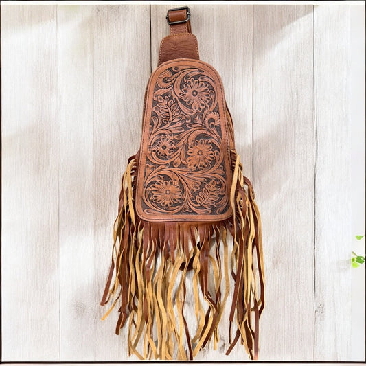 Tan tooled leather fringe sling bag
