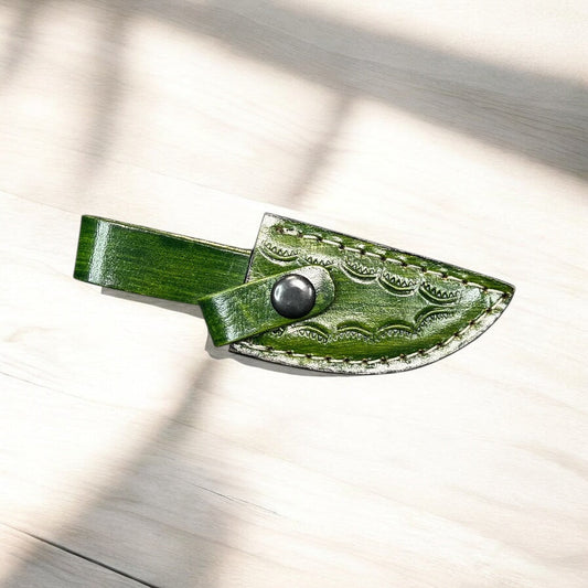 Green tooled leather sheath