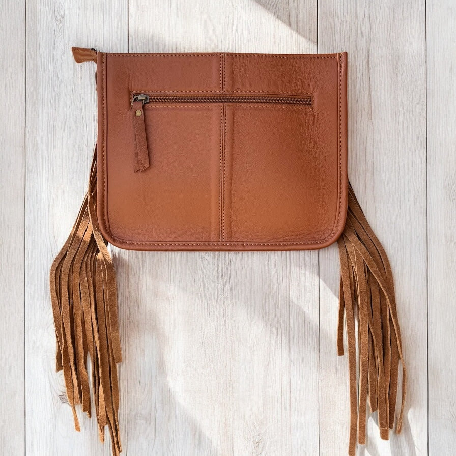 Tan tooled leather fringe crossbody bag