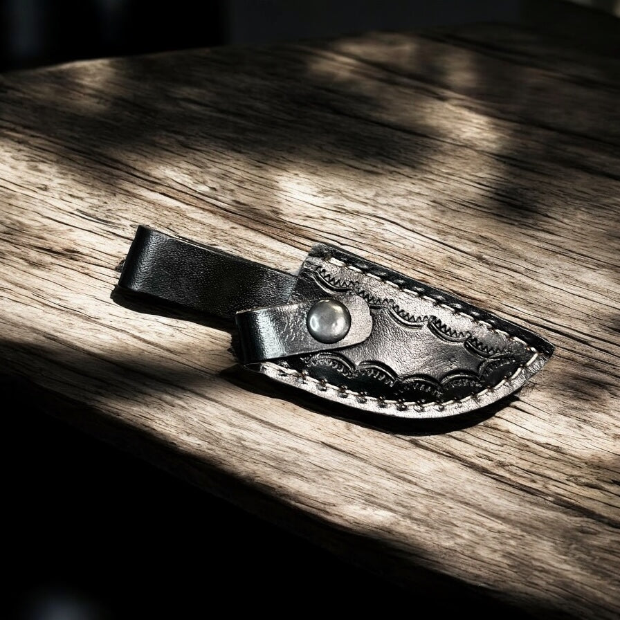Black tooled leather sheath