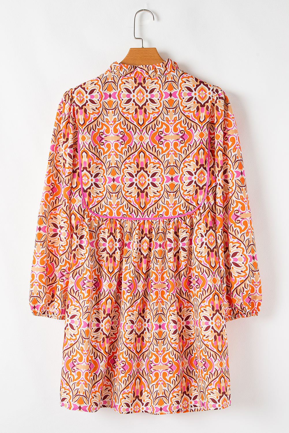 Abstract Long Sleeve Tied Neck Mini Dress