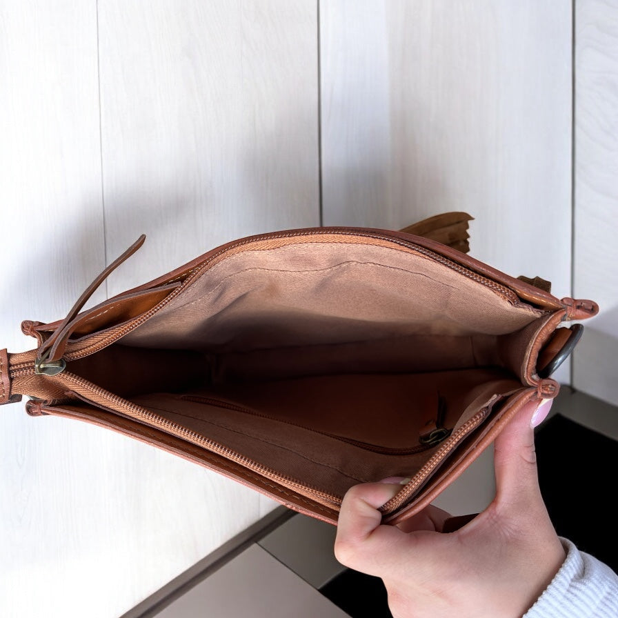 Tan tooled leather fringe crossbody bag