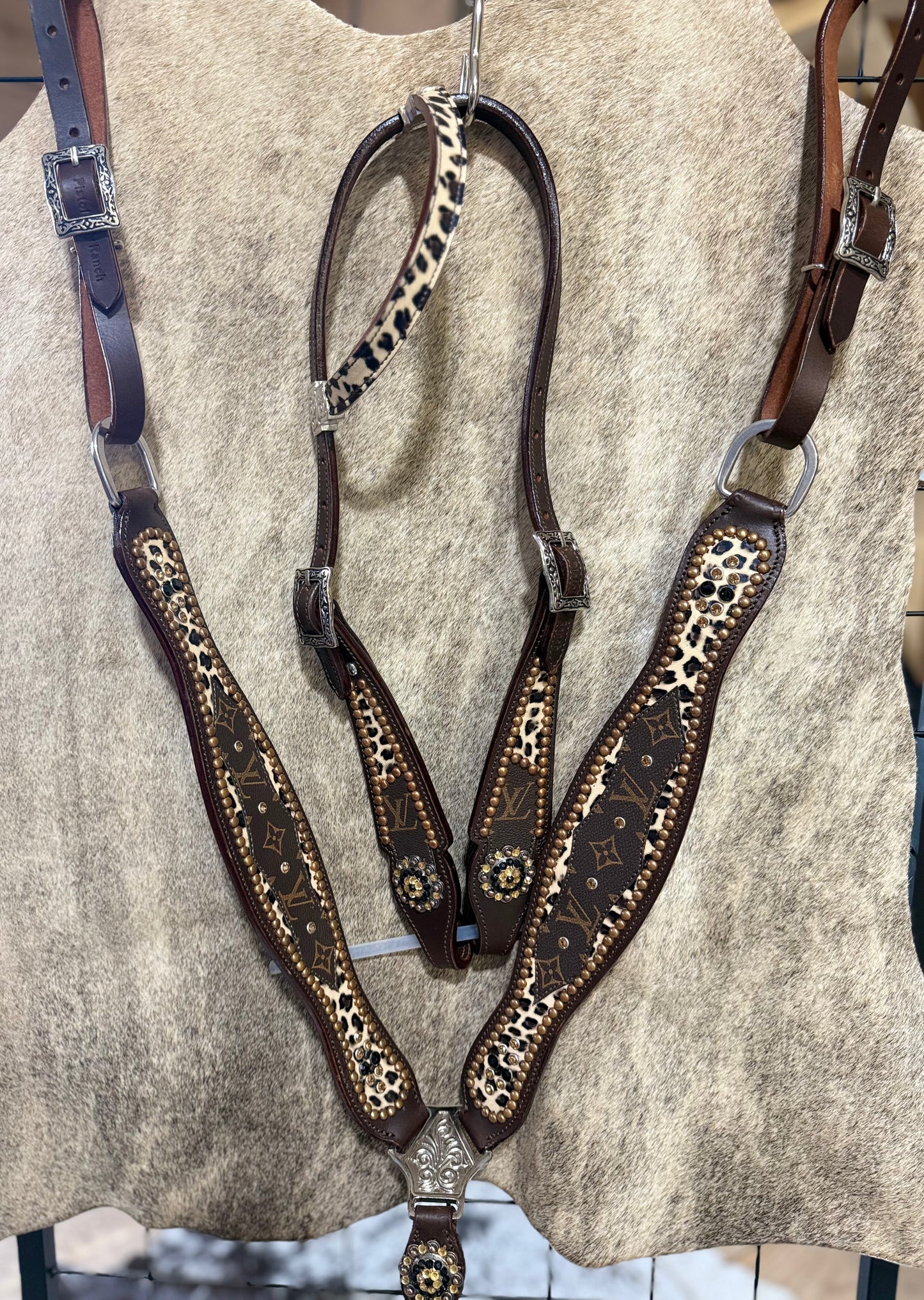 Stunning LV one ear tack set