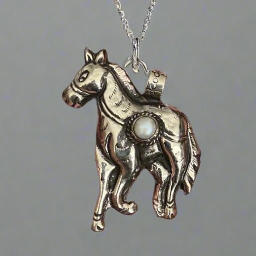 Ornate hand carved silver donkey/horse pendant