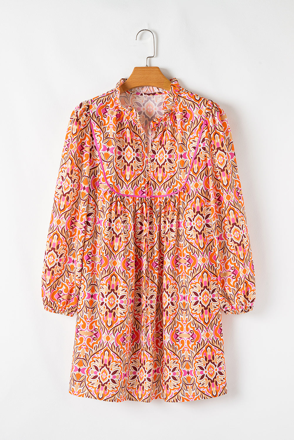 Abstract Long Sleeve Tied Neck Mini Dress