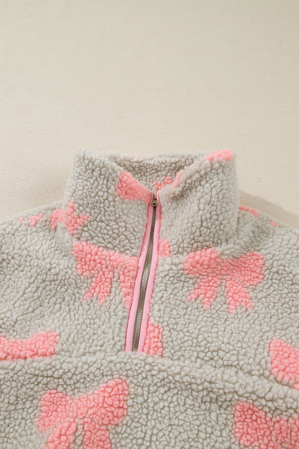 Bow Tie Sherpa Quarter Zip Sweatshirt